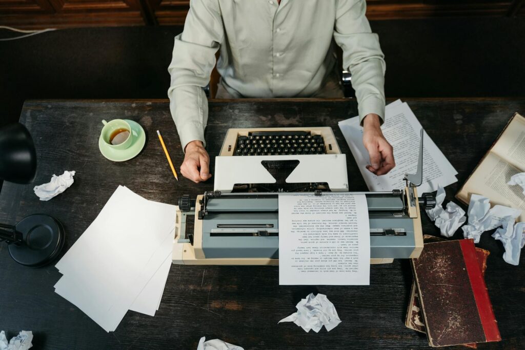 author writing at desk