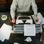 author writing at desk