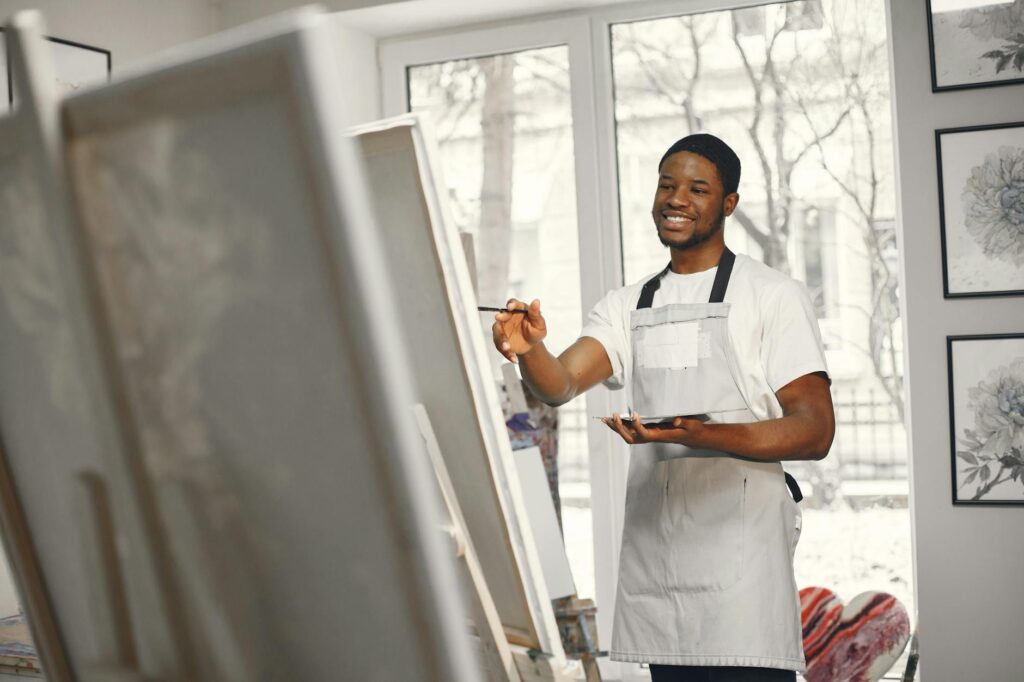 Black artist painting abstract