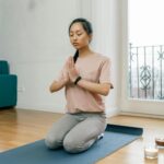 person meditating outdoors UK