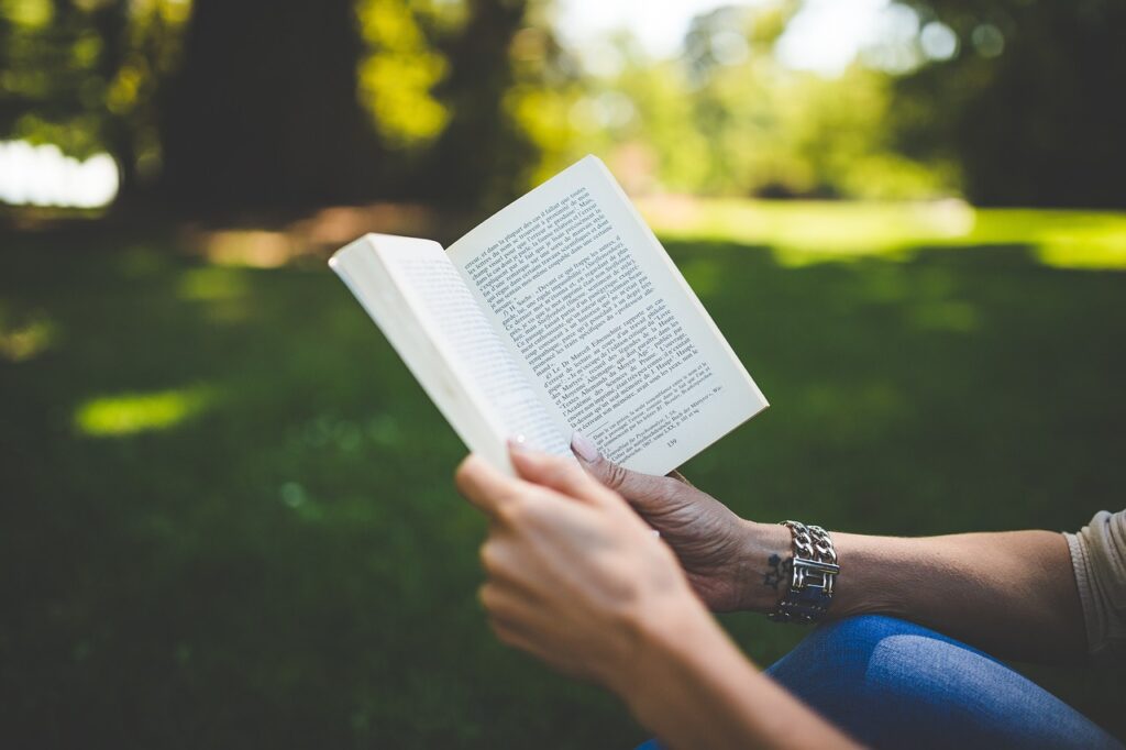 person reading transformative book