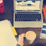 person working diligently at desk