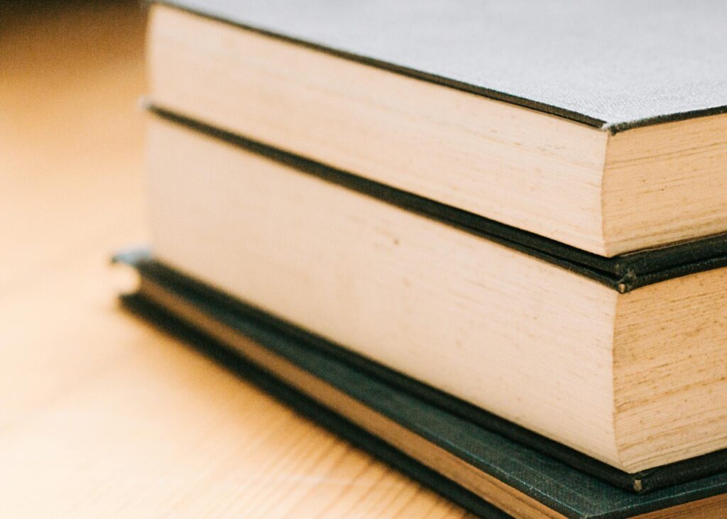 stack of biography books