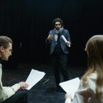 actors auditioning on stage and screen