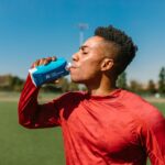 athlete drinking water