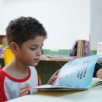 children reading unite for literacy books