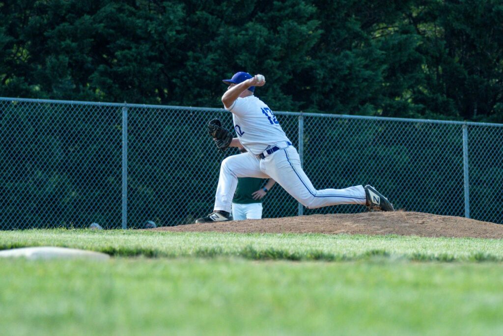 college baseball player signing scholarship