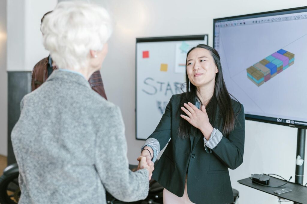 corporate startup partnership handshake