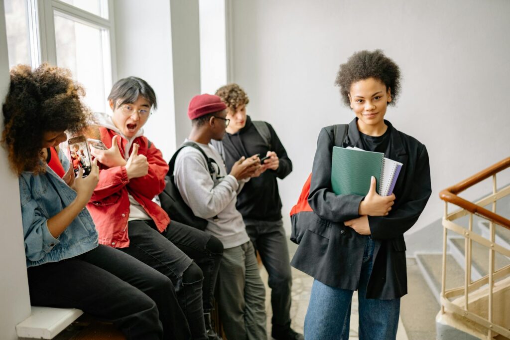 diverse group of teens watching tv