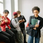 diverse group of teens watching tv