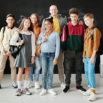 diverse group of teens watching TV