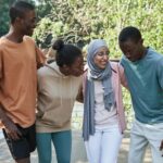 diverse group of young people watching streaming