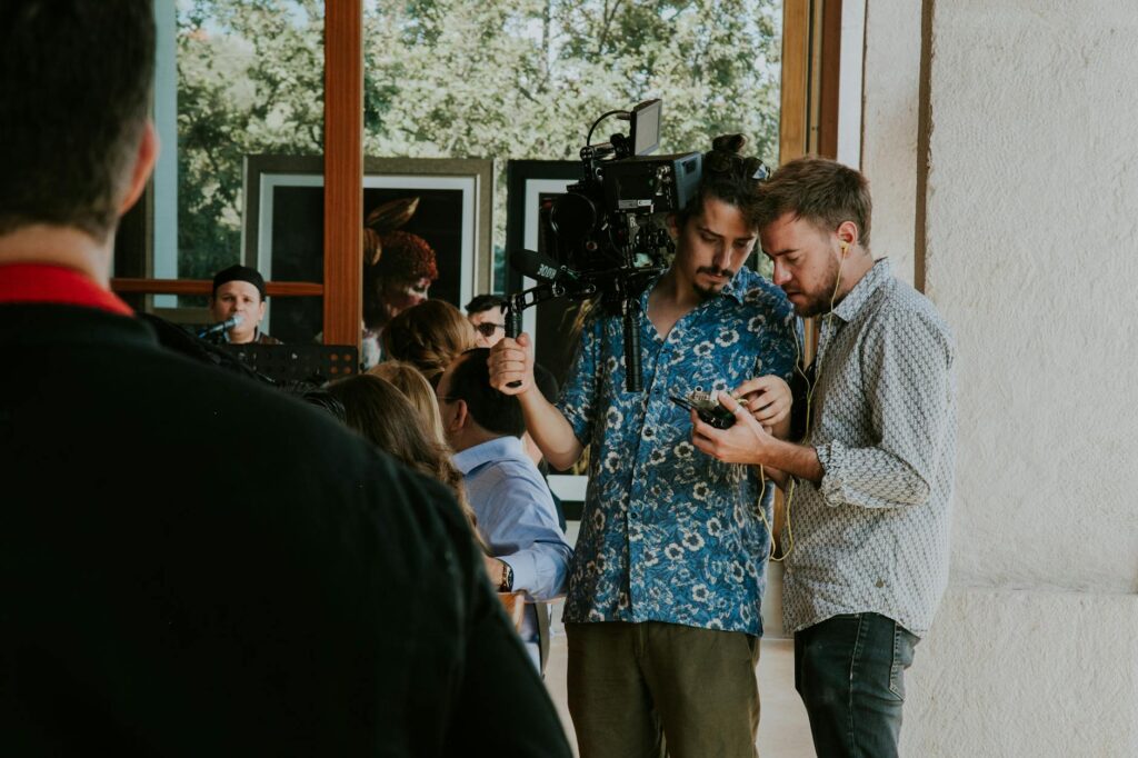 filmmakers discussing TV production options