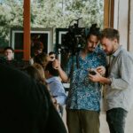 filmmakers discussing TV production options