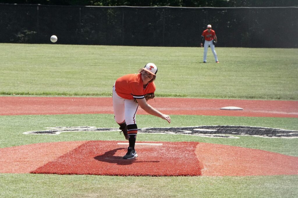JUCO baseball player with data chart