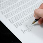 person signing legal document