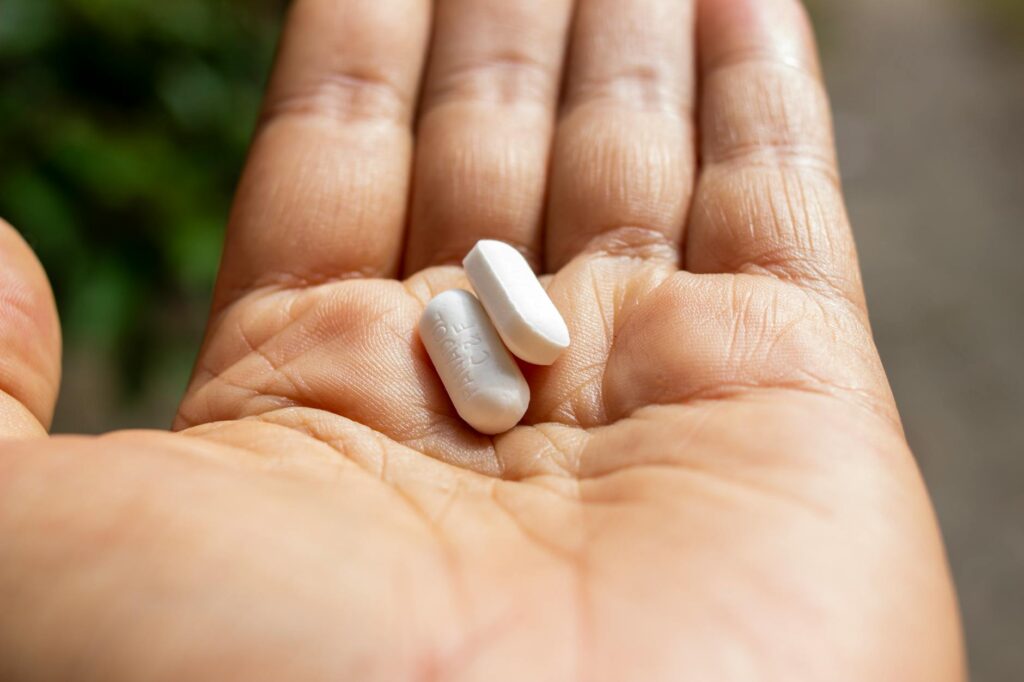 person taking many pills