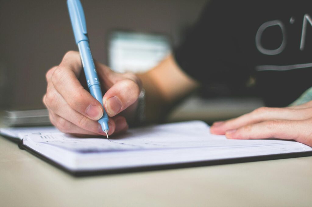 person writing lifestyle blog