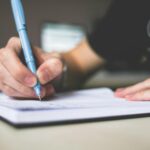 person writing lifestyle blog