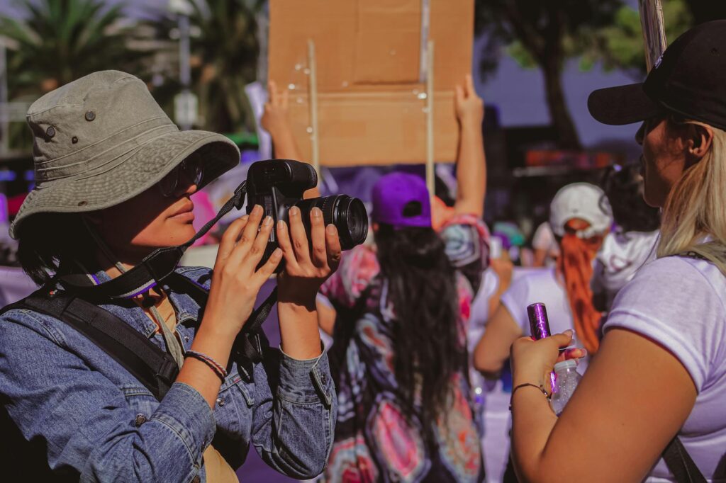 photojournalist documenting a protest