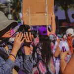 photojournalist documenting a protest
