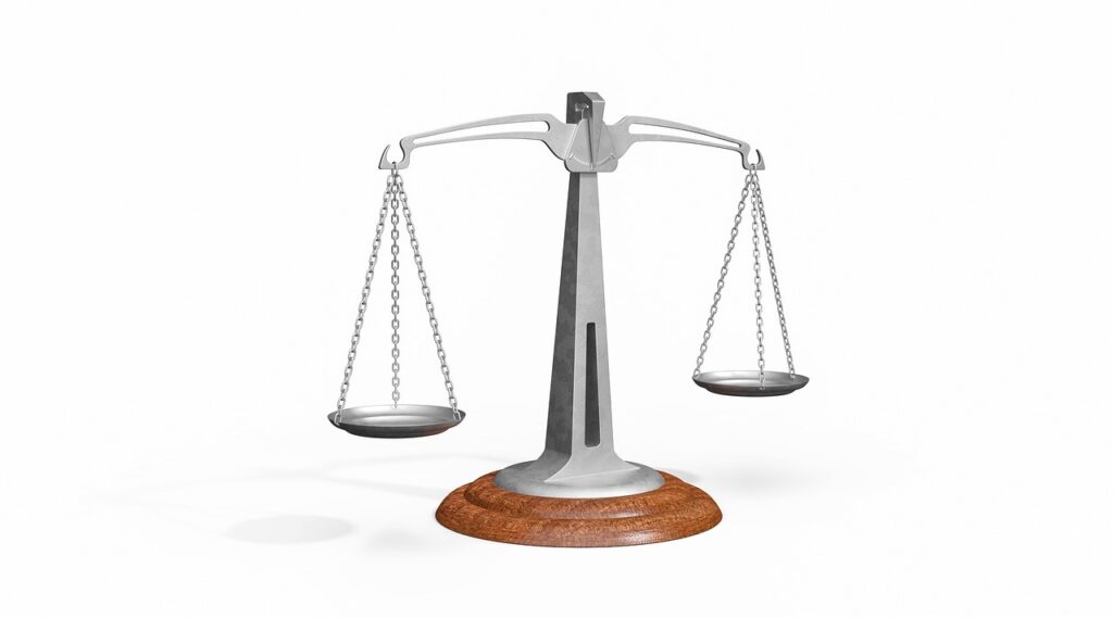 self defense law scales