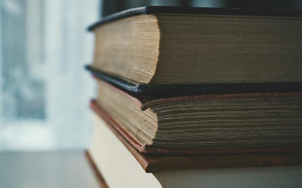 stack of financial books