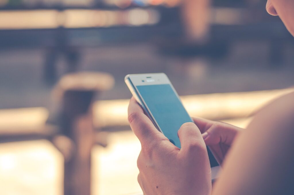 teenagers using smartphones