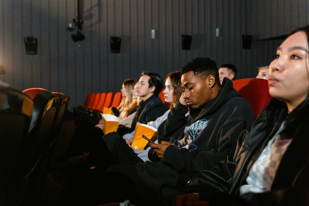young people watching streaming