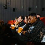 young people watching streaming