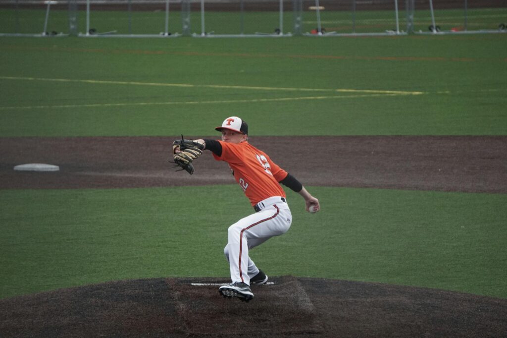 youth baseball pitcher throwing